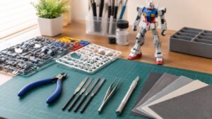 プラモデル用工具としてニッパーやヤスリやピンセットを作業台に並べた模型制作セット